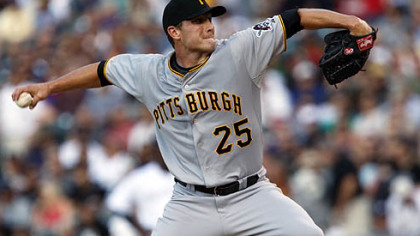 Pirates starting pitcher Kevin Hart works against the Rockies in the first inning.