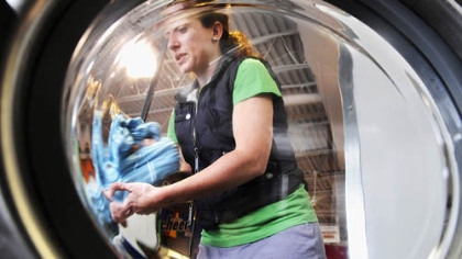 Jessica Crandall does laundry at the Laundry Factory in Shadyside.