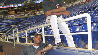 Pirates outfielders Nyjer Morgan, below, and Andrew McCutchen at the Metrodome in Minneapolis.