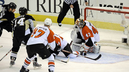 Bill Guerin scores the winning goal against the Flyers in overtime.