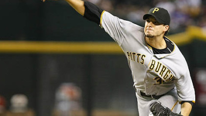 Pirates pitcher Charlie Morton throws against the Diamondbacks in the first inning last night in Phoenix.