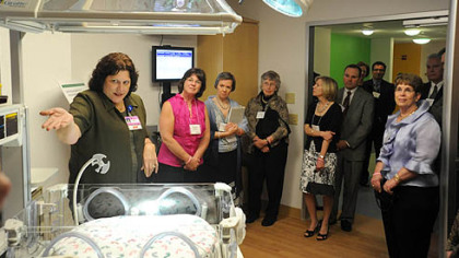Mavis Rhea, RN, gives a portion of the tour during the donor's preview party of the new Children's Hospital in Lawrenceville.