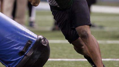 Missouri defensive lineman Evander Hood runs a football drill at the NFL scouting combine in Indianapolis, Feb. 23, 2009.