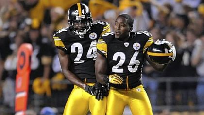Steelers cornerbacks Ike Taylor and Deshea Townsend celebrate after blocking a field goal attempt by the Titans' in the second quarter tonight at Heinz Field.