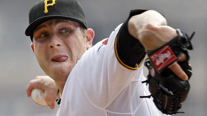 Pirates pitcher Kevin Hart throws in the first inning.