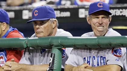 Cubs manager Lou Piniella, left, and bench coach Alan Trammell watch the final out in the ninth inning of Chicago's 3-0 loss.