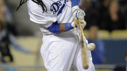 Dodgers outfielder Manny Ramirez grounds out to third during the fifth inning.