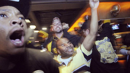 Fans in the Sports Rock Cafe in the Strip District cheer on the Steelers in the final minutes of their victory over the Arizona Cardinals.