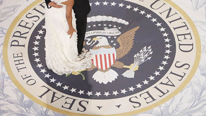President Barack Obama dances with first lady Michelle Obama at the Commander in Chief Ball at the National Building Museum in Washington, yesterday.