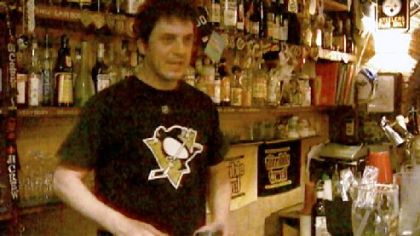 Giovanni Poggi behind the bar at La Botticella in Rome.