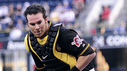 Catcher Ryan Doumit fields a ground ball to force out Atlanta's Brian McCann in the second inning last night at PNC Park.