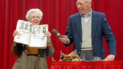 Ruth Meanor and her husband, Clyde, show pages of fashions from a magazine that had been placed in a 1942 time capsule that was buried at the former Carnot Elementary School. The Meanors graduated from the school in 1943.