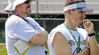 Penn-Trafford first-year head coach T.J. Wiley, right, has an experienced hand running his offense -- his father, John.