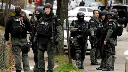 Pittsburgh SWAT members converge after a standoff ended in the 5600 block of Hays Street in East Liberty.
