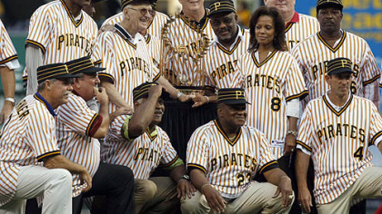 Members of the 1979 world championship Pirates together with the World Series trophy before Saturday night's game. From left to right, top row, Omar Moreno, Bruce Kison, partially blocked by Chuck Tanner, Kent Tekulve, Bill Madlock, wife of the late slugger Willie Stargell, Margaret Stargell, Don Robinson, and Rennie Stennett,, Bottom row right to left are Dale Berra , Mike Easler, Grant Jackson, Steve Nicosia and Phil Garner.