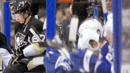 Sidney Crosby sits on the boards in the third period of Saturday's 6-2 loss to the Maple Leafs in Toronto.