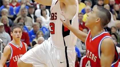Moon's Ryan Falbo, driving to the basket Chartiers Valley, is a two-sport standout for Moon who plans to play football at Yale.