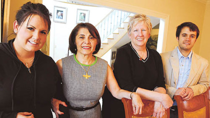 Shukuh Ghaznavi, second from left, invited her Pitt students to a traditional Persian New Year feast at her Indiana Township home. From left are Heather Marino, Ghaznavi, Kirsti Adkins and Ben Mericli.