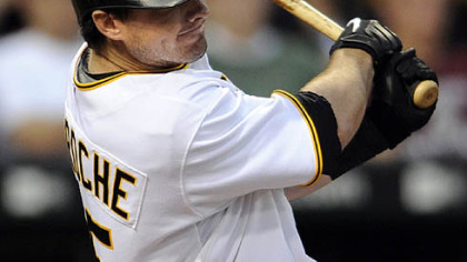 Pirates third baseman Andy LaRoche throws to first base after fielding a ball hit by Houston Astros left fielder Carlos Lee during the second inning of last night's game. Lee was safe at first on the play.