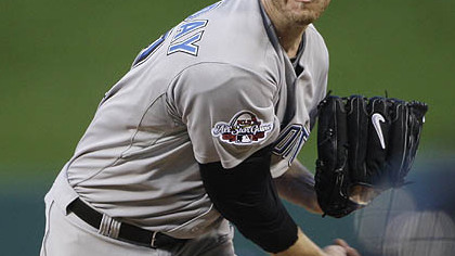 Roy Halladay of the Blue Jays pitches during the first inning.