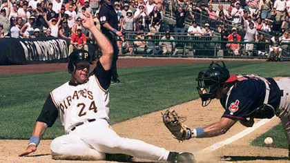 Brian Giles gets by Cleveland Indians catcher Einar Diaz to score the winning run back in June of 2001. Giles scored from second base on a hit by Aramis Ramirez, to beat the Indians, 1-0.