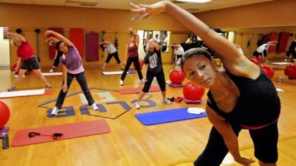 Maria Caruso, founder of Bodiography Contemporary Ballet, teaches an exercise class that incorporates ballet at Club One in Shadyside.