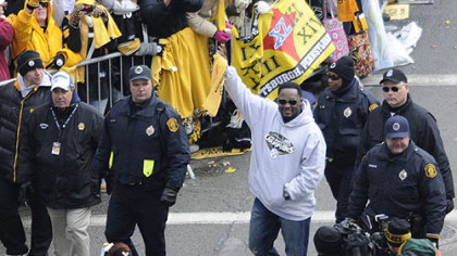 Mike Tomlin waves to the legion of Steelers fans who turned out for the Super Bowl victory parade.