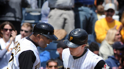 Nate McLouth rounds the bases after hitting a solo homer against the Rockies in the third inning.