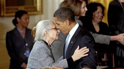 President Barack Obama embraces White House Senior Adviser Valerie Jarrett's mother, Barbara Bowman, yesterday after signing an Executive Order creating the White House Council on Women and Girls.