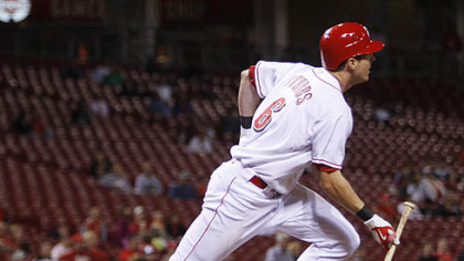 Reds outfielder Drew Stubbs watches his two-run home run off Pirates pitcher Jesse Chavez in the eighth inning during the second game.