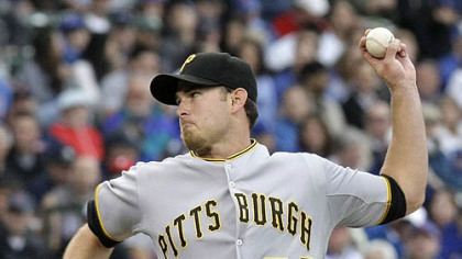 Pirates starting pitcher Zach Duke delivers during the second inning of yesterday's game against the Chicago Cubs at Wrigley Field in Chicago.