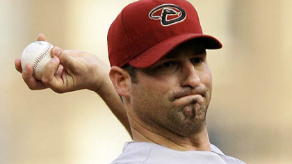 Diamondbacks pitcher Doug Davis throws in the first inning.