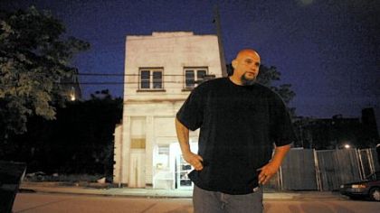 Braddock Mayor John Fetterman talks with reporters after learning of his primary election victory last night.