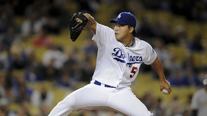 Dodgers relief pitcher Hong-Chih Kuo delivers during the seventh inning.