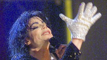 Michael Jackson sports his trademark glove as he performs "Billie Jean" during his "30th Anniversary Celebration, The Solo Years" concert at New York's Madison Square Garden, Friday, Sept. 7, 2001.