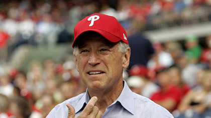 Vice President Joseph Biden rolls up his sleeves before the start of the Pirates game against the Phillies last night in Philadelphia.