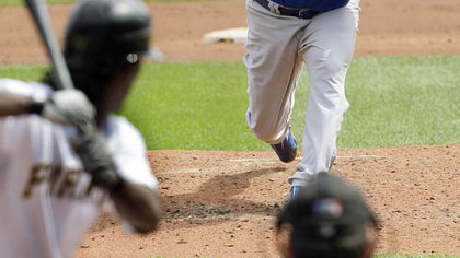 Cubs pitcher Carlos Zambrano throws to Pirates outfielder Andrew McCutchen in the third inning.