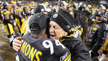 Dick LeBeau celebrates the AFC title at Heinz Field last month with one of his linebackers, Lawrence Timmons. LeBeau just completed his 50th season in the NFL.