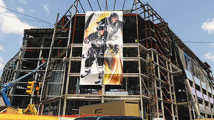 A huge banner of Sidney Crosby and Evgeni Malkin hangs from the new Penguins arena along Fifth Avenue.