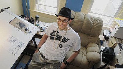 Ed Piskor, 26, cartoonist, in his Southside home and workspace.  His graphic novels, "Wizzywig: Volume 1: Phreak" and Wizzywib: Volume 2: Hacker," were featured in Wired magazine.
