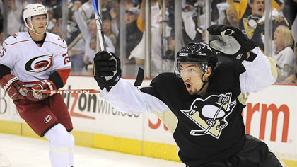 The Penguins' Miroslav Satan celebrates after scoring the first goal against the Hurricanes in their first Eastern Conference final game at Mellon Arena last night.