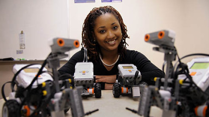 Tonya Groover, a University of Pittsburgh graduate student, helps pique STEM interest by having high school students build robots.