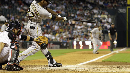 Pirates outfielder Andrew McCutchen hits an RBI-single to score teammate Ramon Vazquez during the seventh inning of last night's game.