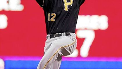 Pirates second baseman Freddy Sanchez comes down with the line drive hit by Phillies catcher Paul Bako in the second inning last night.