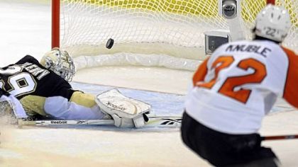 The Flyers' Mike Knuble gets a shot past Marc-Andre Fleury in the third period of Game 5 last night at Mellon Arena.