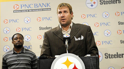 Steelers quarterback Ben Roethlisberger, flanked by head coach Mike Tomlin, reads a brief statement denying allegations he sexually assaulted a woman in 2008 at Harrah's Lake Tahoe Resort.