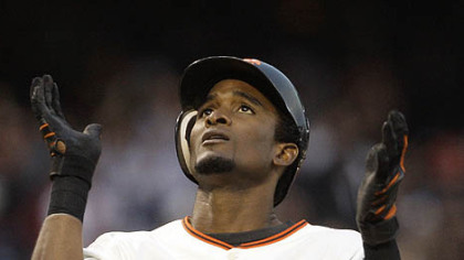 Giants second baseman Eugenio Velez celebrates his home run hit off Pirates pitcher Charlie Morton during the second inning.