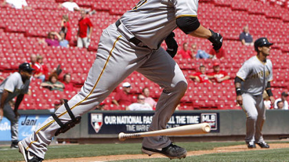 Pirates catcher Jason Jaramillo watches his RBI single hit off Reds pitcher Carlos Fisher in the seventh inning of game 1.