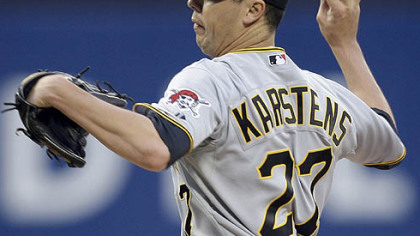 The Pirates' Jeff Karstens delivers against the New York Mets in the first inning last night at Citi Field in New York.