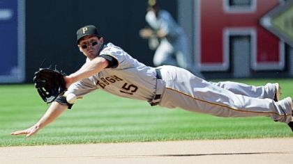 Pirates third baseman Andy LaRoche dives for a ball hit by the Phillies' Pedro Feliz in the eighth inning yesterday. LaRoche made the catch for the third out.